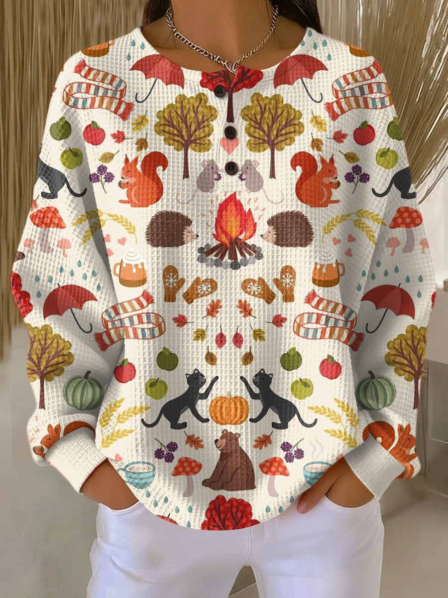 Women's waffle-knit jumper in off-white with woodland animal and leaf print