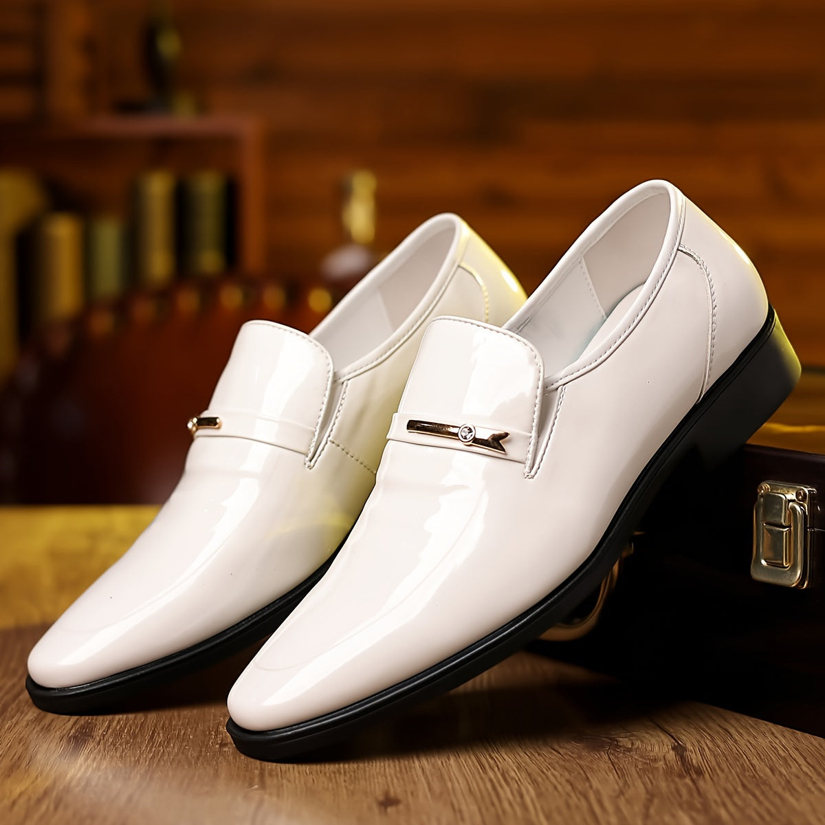 Men's white patent leather penny loafers, pointed toe slip-on pair with metal bar