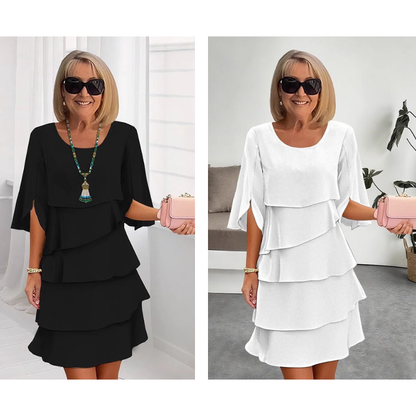Tiered puff sleeve dresses in black and white, layered ruffle skirts