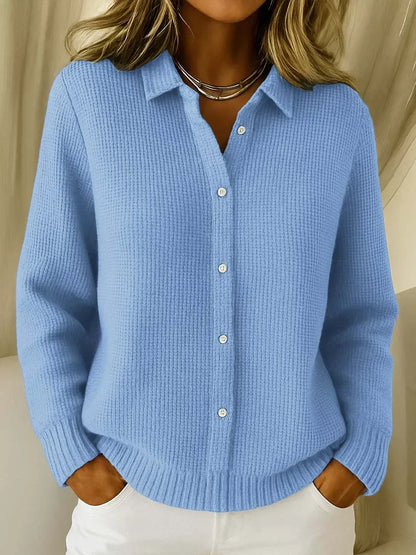 Blue knit cardigan sweater with point collar, button-front, long sleeves, ribbed hem