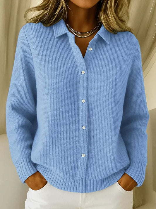 Blue knit cardigan sweater with point collar, button-front, long sleeves, ribbed hem