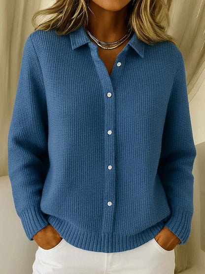Blue knit cardigan sweater with point collar, button-front, long sleeves, ribbed hem