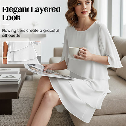 White tiered ruffle-sleeve dress with cape-like sleeves