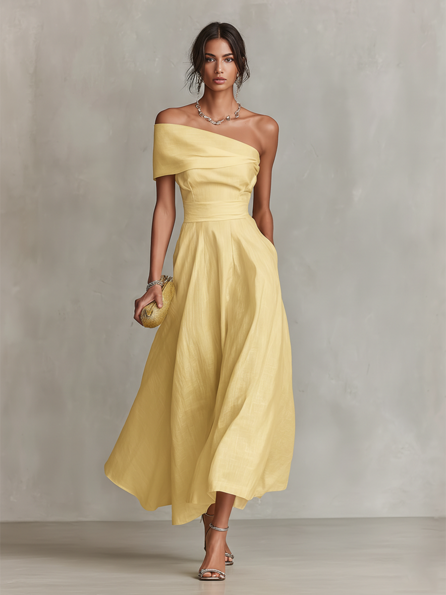 Women's yellow one-shoulder linen dress with draped neckline and gathered skirt