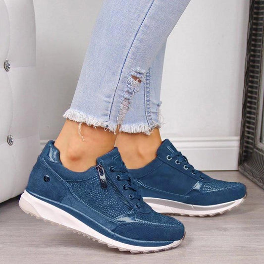 Blue orthopaedic zip trainers with lace-up front, textured mesh panels, white sole
