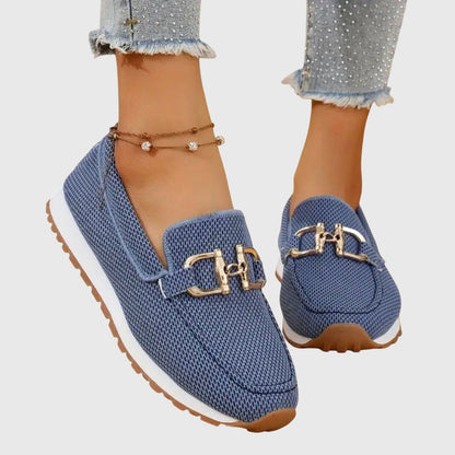 Blue textured ladies loafers with gold buckle detail and cushioned sole
