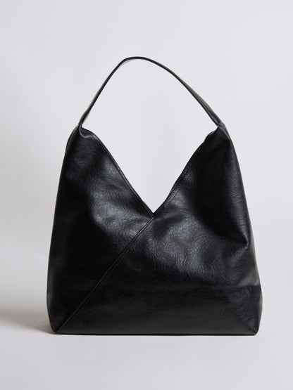 Black leather shoulder bag with short handles and V-shaped open front.