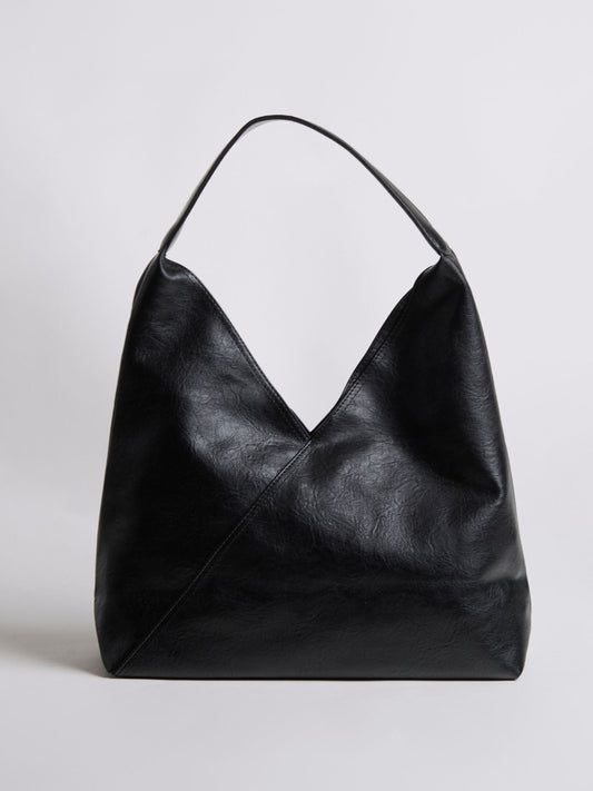 Black leather shoulder bag with short handles and V-shaped open front.