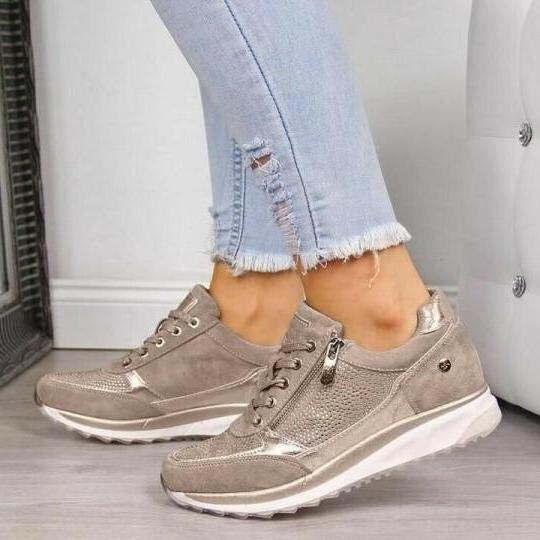 Light beige orthopaedic zip trainers with lace-up front and padded white sole