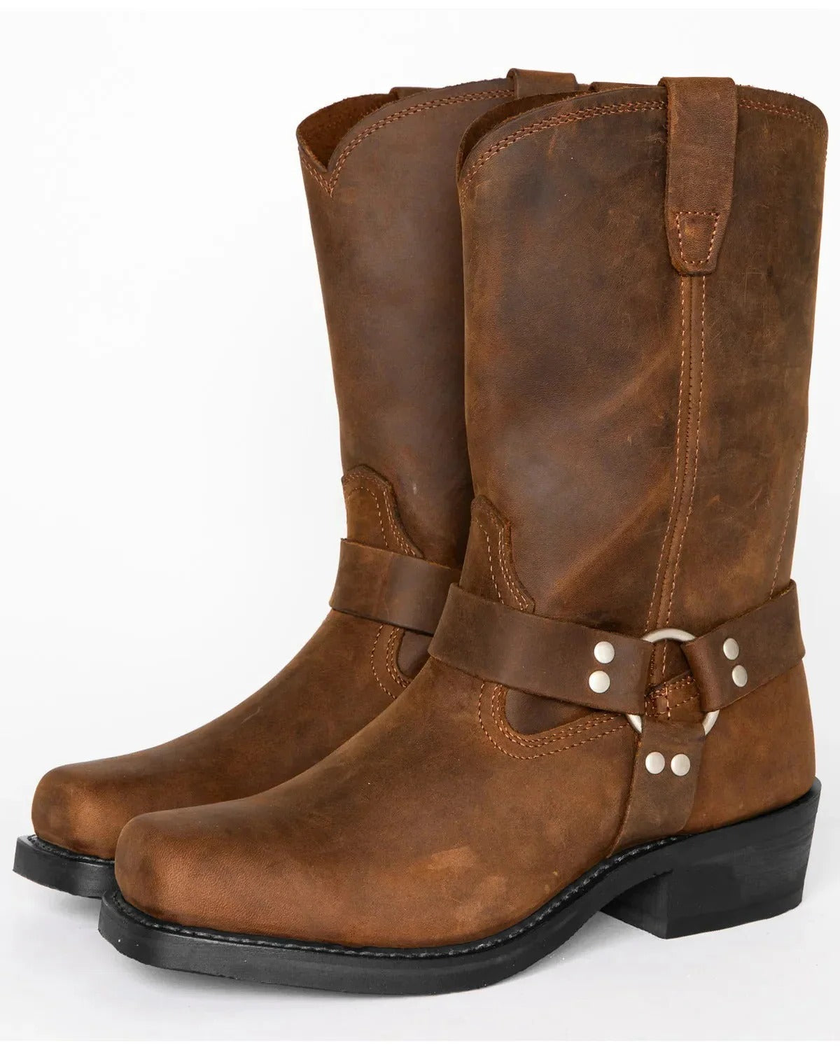 Men's brown harness boots with ankle strap and metal studs, pair side-by-side