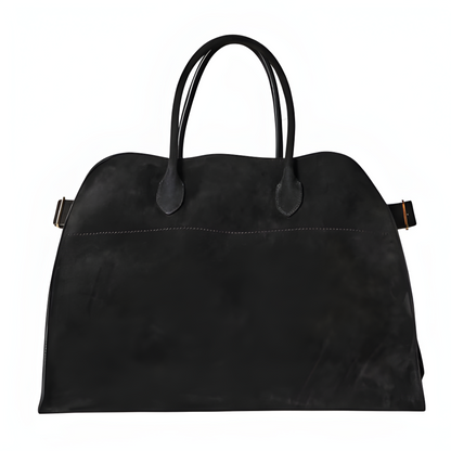 Black suede tote handbag with two top handles and stitched decorative panel