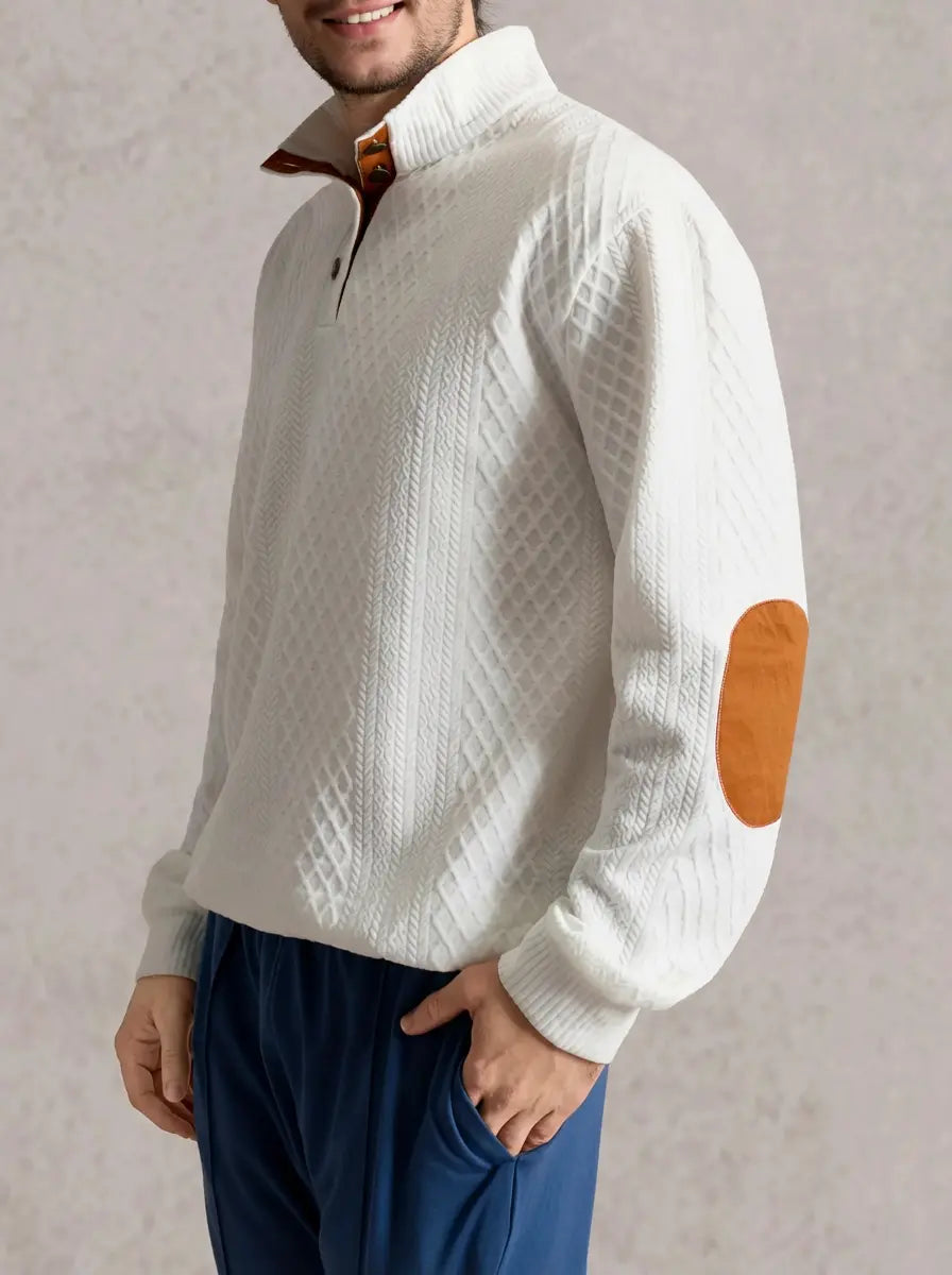 White cable knit quarter-button pullover sweatshirt with brown collar placket and long sleeves