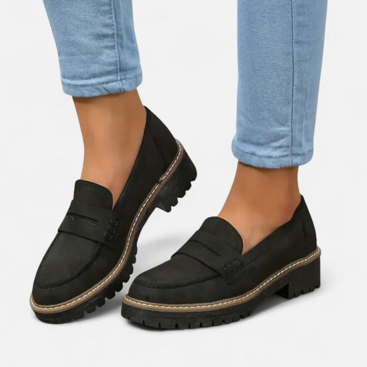 Skylar orthopaedic heeled loafers in black suede with buckle strap and tread sole
