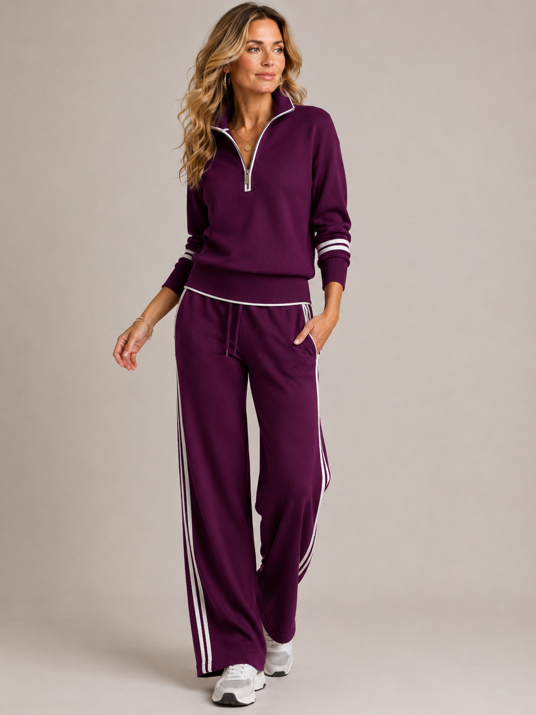 Women’s two-piece quarter-zip knit set, purple top with striped wide-leg joggers