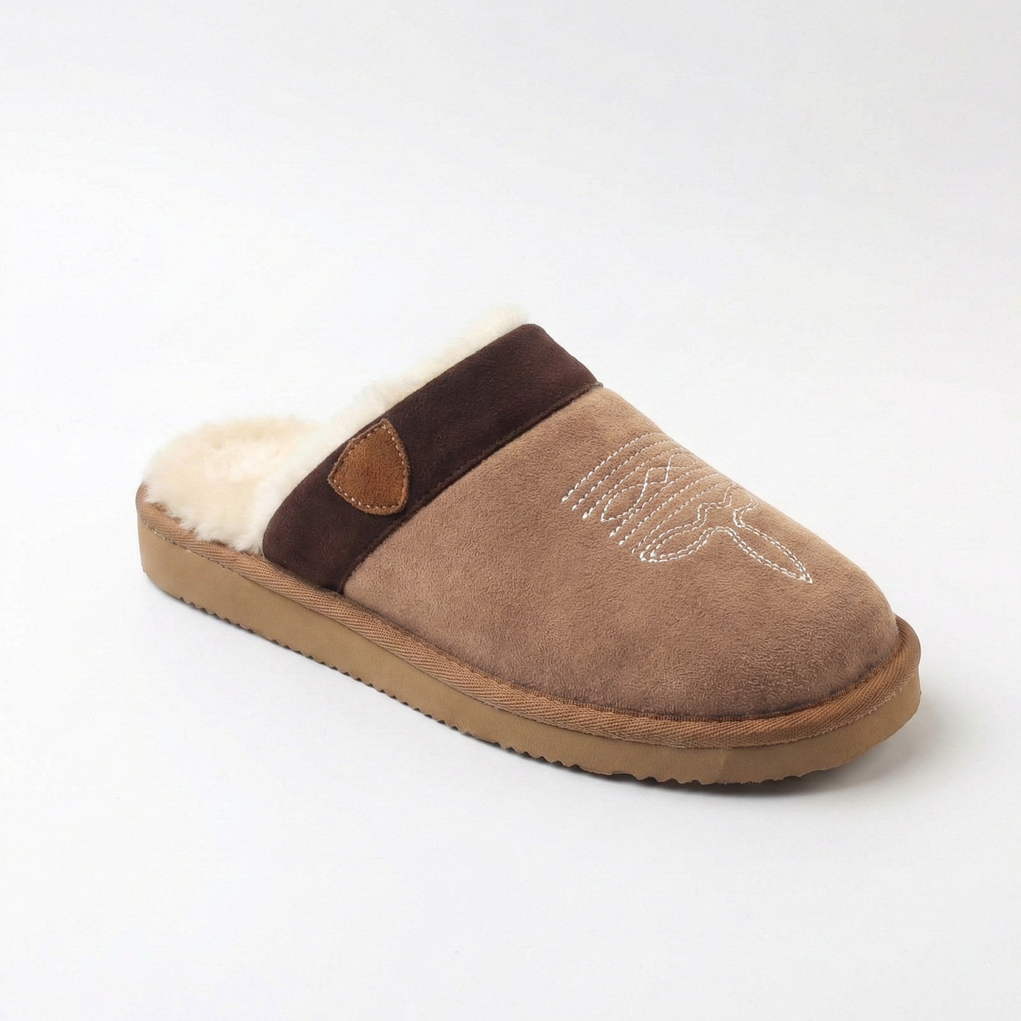 Cowboy slippers with plush white lining, dark cross-strap detail, stitched side pattern.