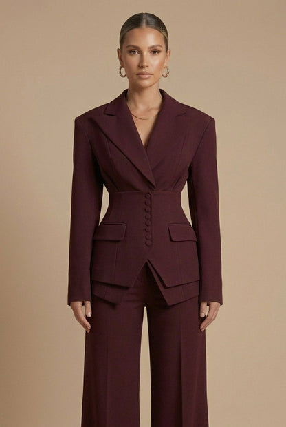 Wine red trouser suit: tailored blazer with button detail and matching wide-leg trousers