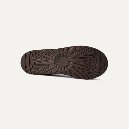 Chestnut brown rubber outsole with molded traction pattern