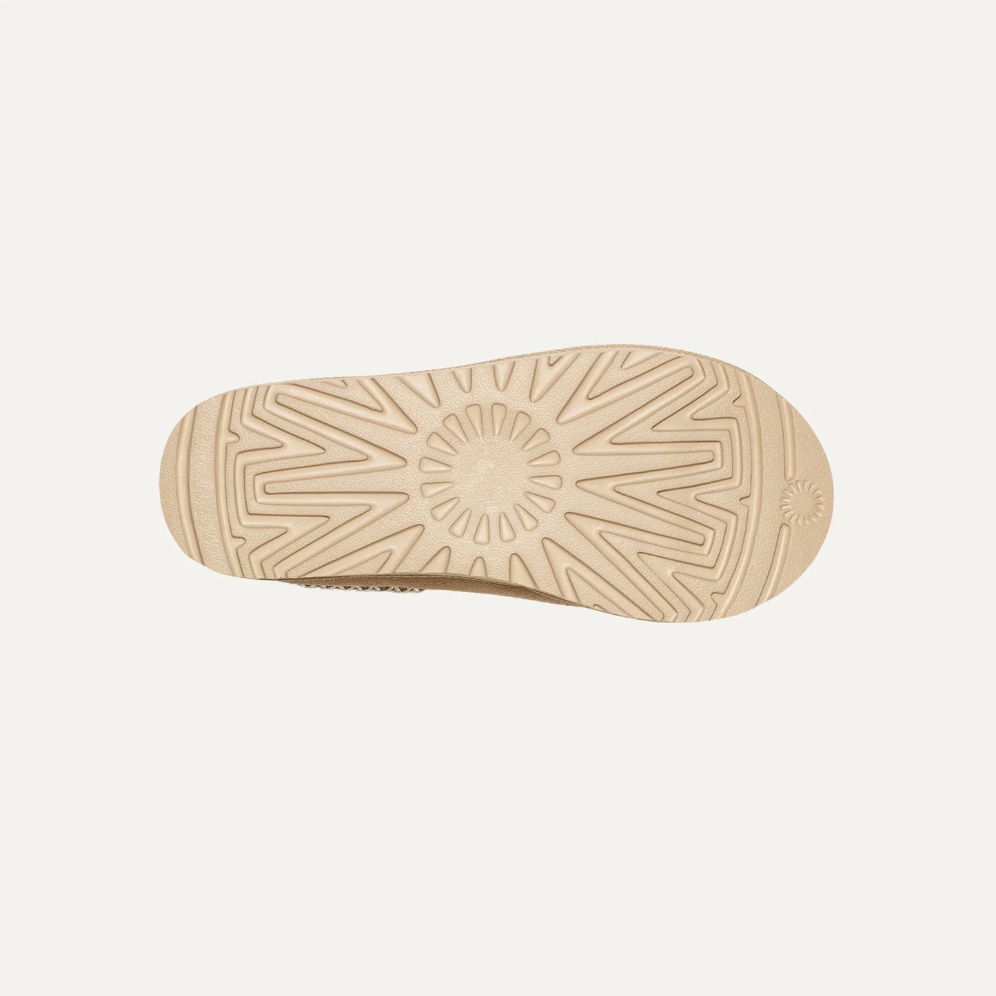 Mocha tan rubber outsole with molded traction pattern