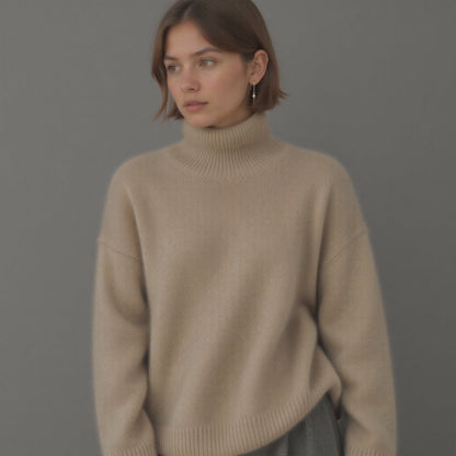 Beige oversized roll-neck cashmere jumper, side view with ribbed details