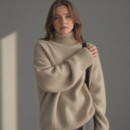 Cream/beige oversized roll-neck cashmere jumper, front view with relaxed fit
