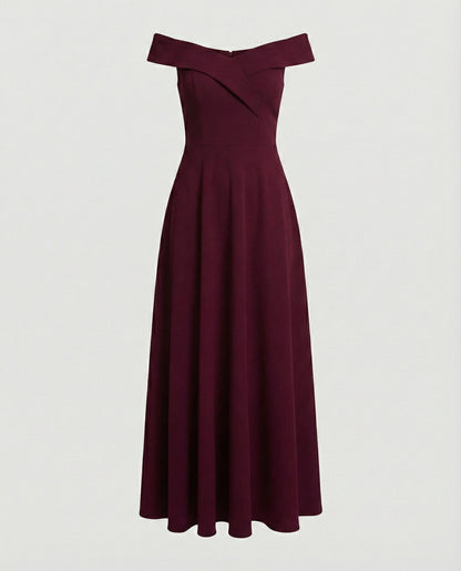 Red off-shoulder long evening dress on mannequin, wide neckline and flared pleated hem