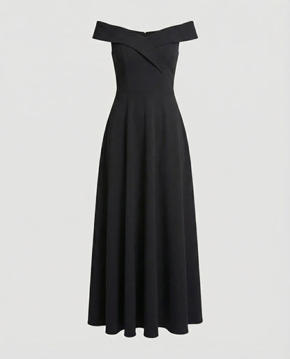 Black off-shoulder long evening dress on mannequin, wide neckline and pleated skirt
