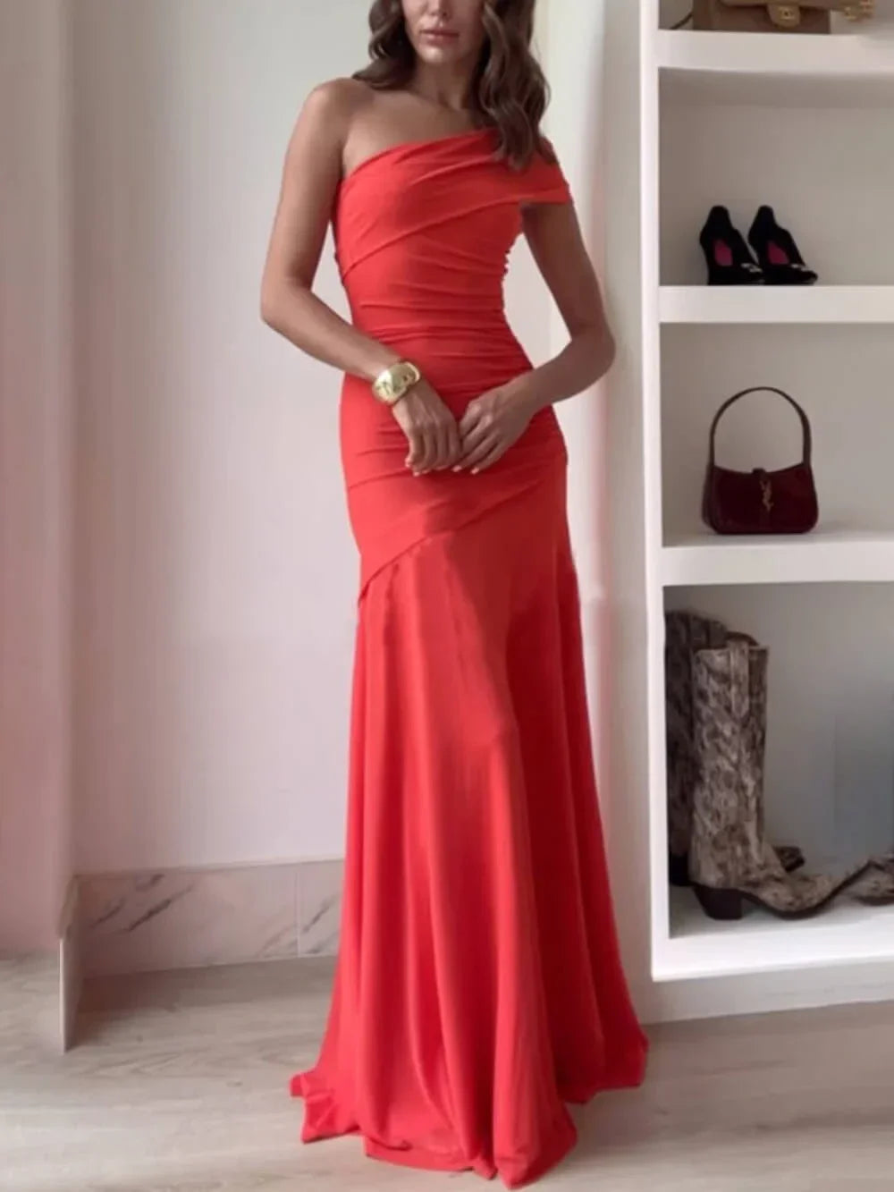 Coral-red one-shoulder ruched maxi dress with gathered side drape, fitted silhouette