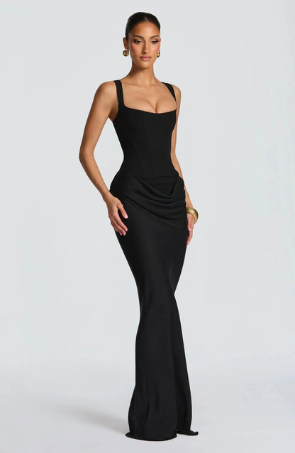 Black bodycon maxi dress with spaghetti straps and ruched hip detail