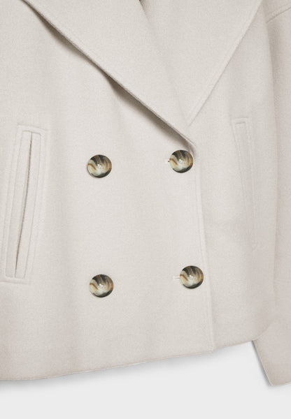 Cropped double-breasted jacket chest, off-white fabric and button closure details