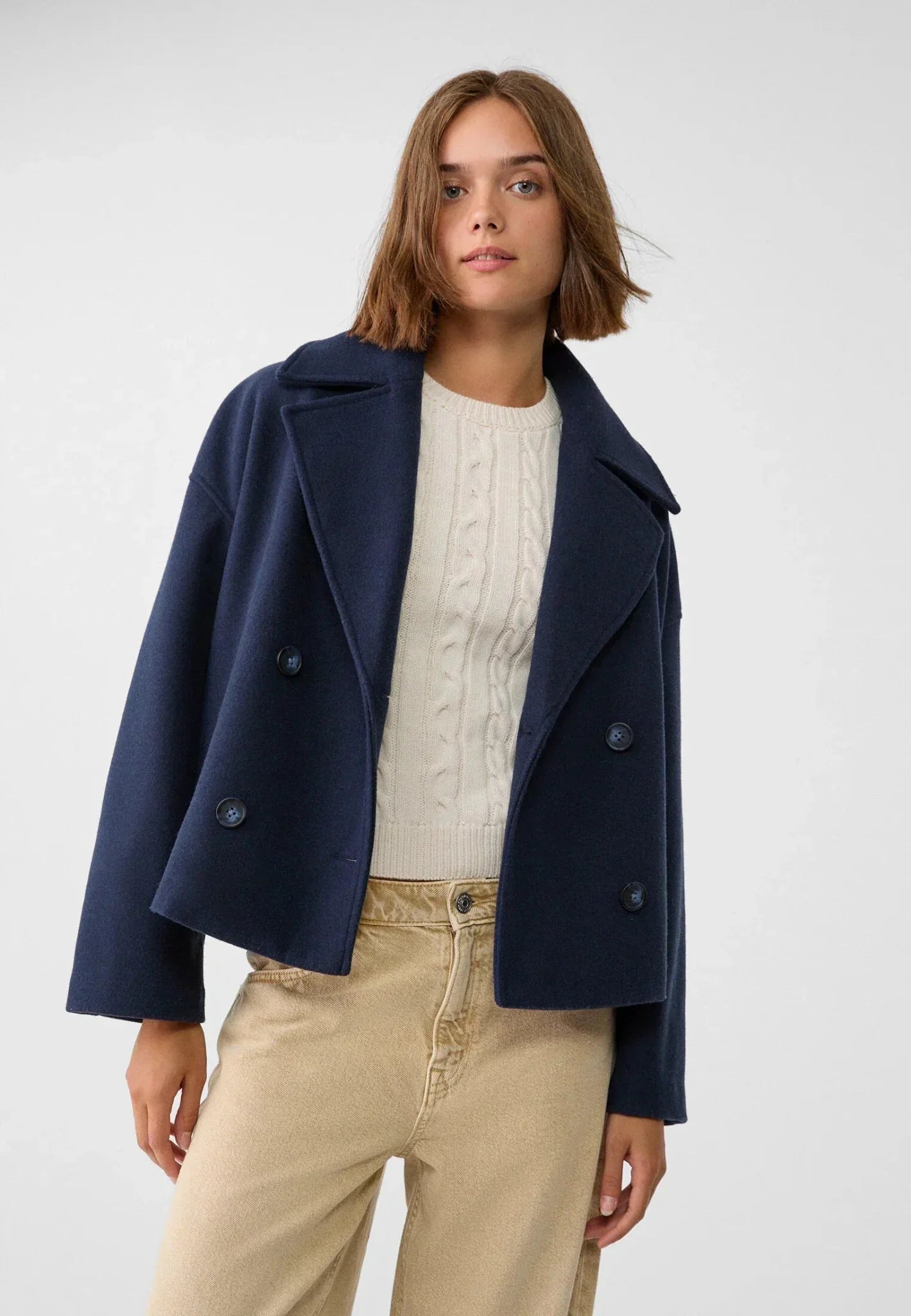 Cropped double-breasted jacket in navy, notched lapels with buttoned double-breast
