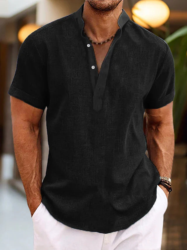 Men's black linen henley shirt with short sleeves and buttoned neckline.