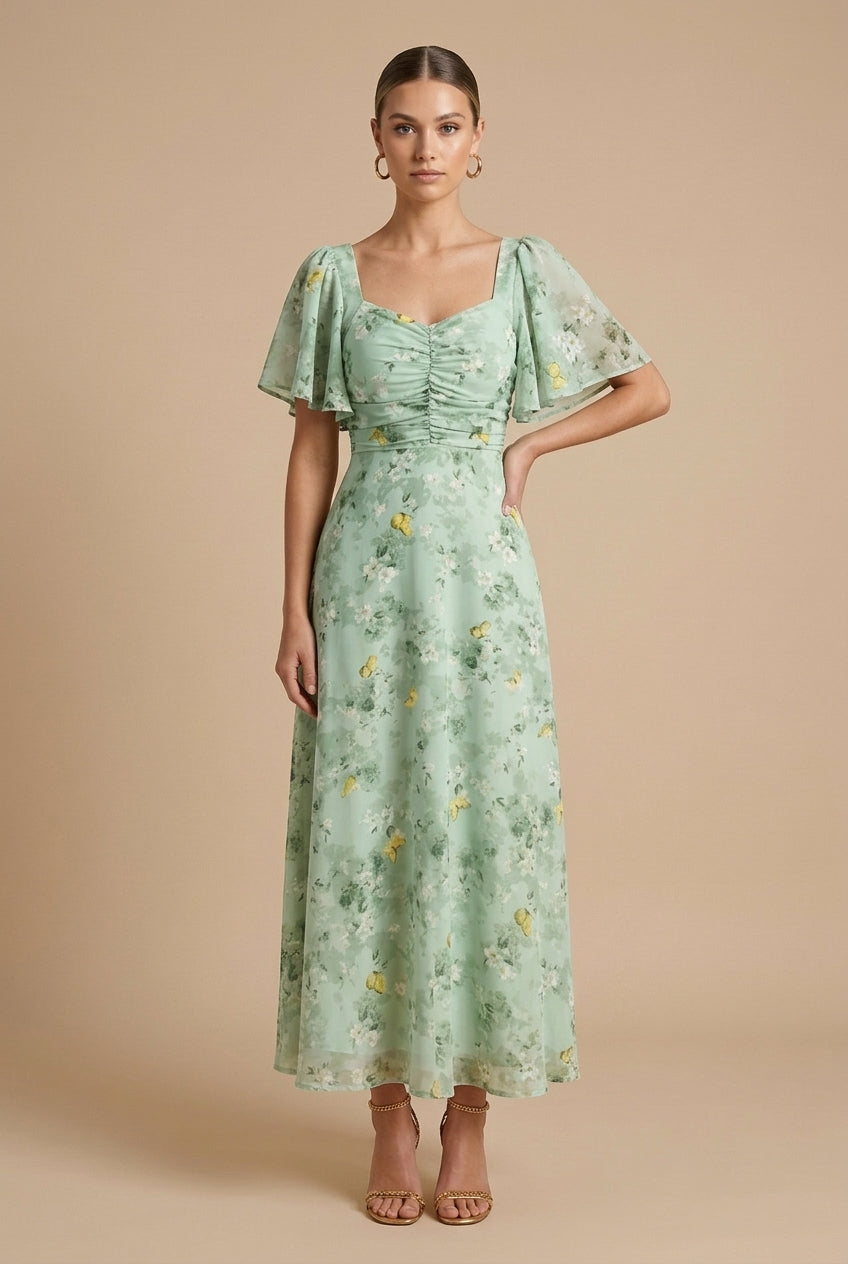 Light green floral maxi dress with square neckline, ruched bodice and short puff sleeves