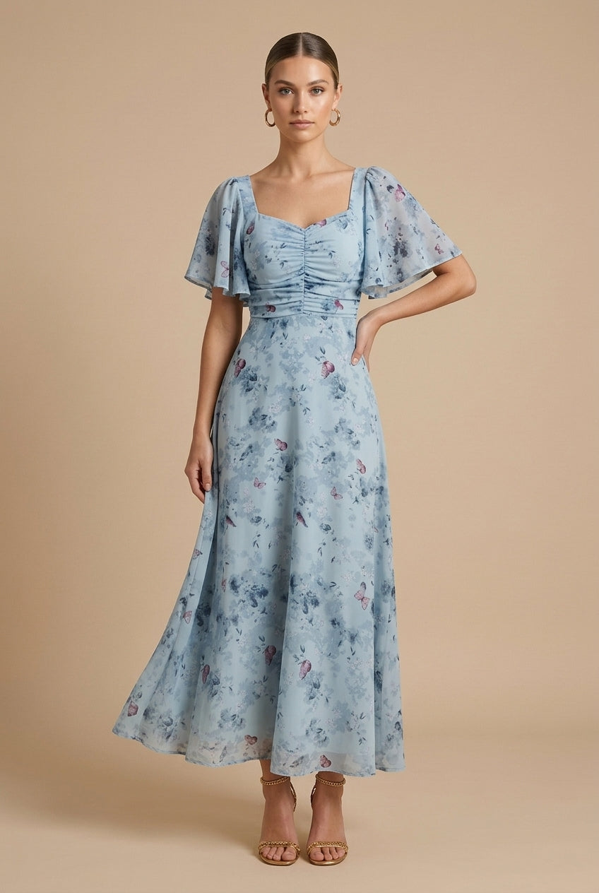 Light blue floral maxi dress with square neckline, ruched bodice and short puff sleeves