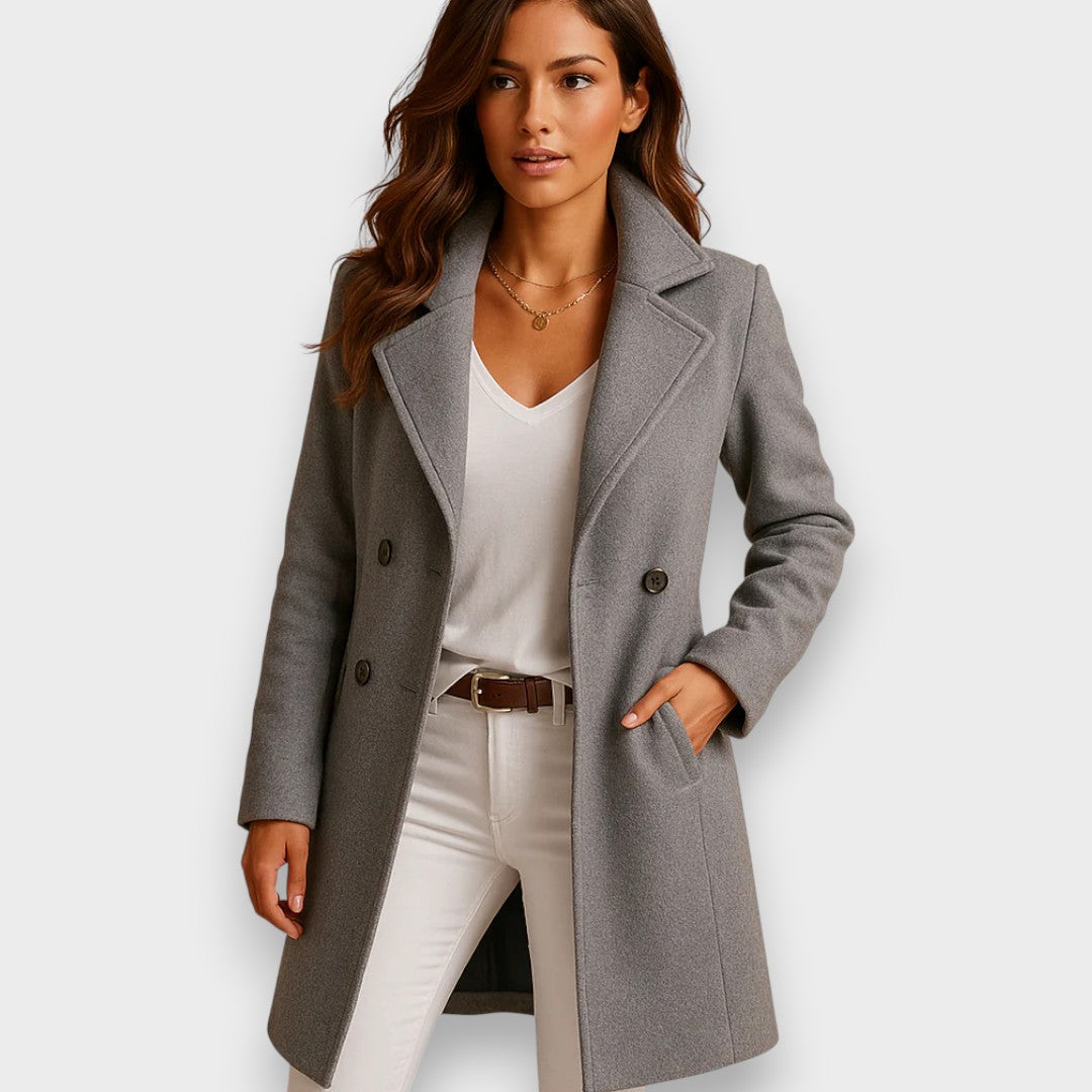 Women's long wool coat, grey, notched lapel, double-breasted button front.