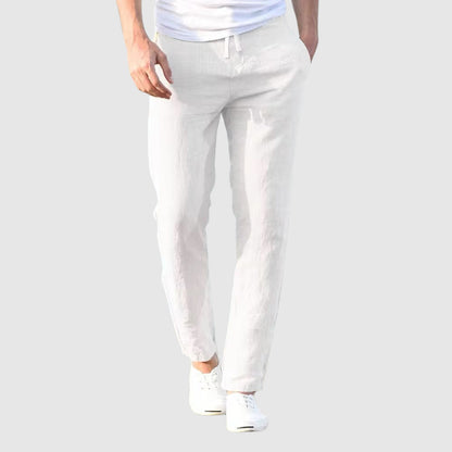 White lightweight linen pants with drawstring waist and tapered ankle-length legs