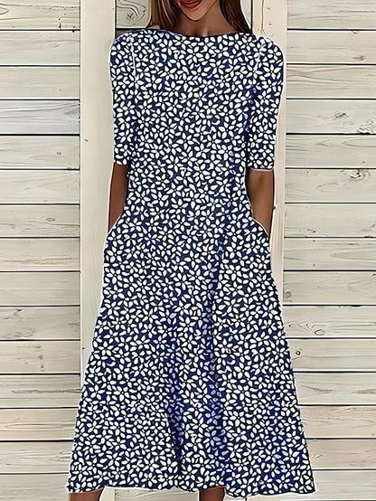 Floral midi dress in navy with white micro pattern, round neckline and short sleeves